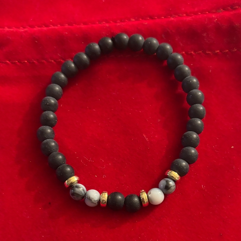 Black and White Beaded Bracelet with Gold Accents